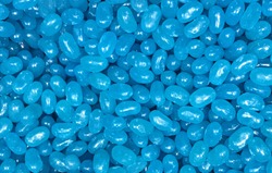Colorful light blue jellybeans with space for text. Can be used as a background.