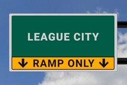 League City logo. League City lettering on a road sign. Signpost at entrance to League City, USA. Green pointer in American style. Road sign in the United States of America. Sky in background