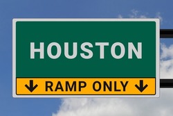 Houston logo. Houston lettering on a road sign. Signpost at entrance to Houston, USA. Green pointer in American style. Road sign in the United States of America. Sky in background