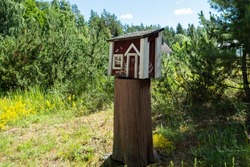 Creative mailbox in rural area. Post delivery and postal service in countryside concept.
