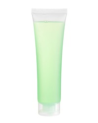 Tall translucent plastic tube with green gel soap inside, transparent cap, isolated on white background