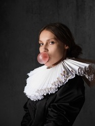 A noble lady in an old round collar chews gum and inflates a bubble. A portrait in the Renaissance style with elements of modernity.