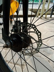 Details of a bicycle's wheel. Bicycle spoke.