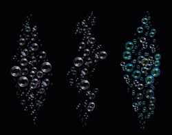 Big and small bubbles (3 types), in aquarium soda pop champagne effervescent drinks. Flowing underwater air bubbles on a black background.