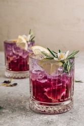 Butterfly pea flower tea with lemon. Purple iced lemonade. Healthy detox herbal drink. Selective focus