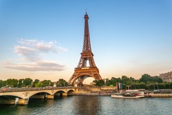 Eiffel Tower at sunset with seine river