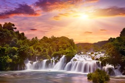 Beautiful Skradinski Buk Waterfall In Krka National Park - Dalmatia Croatia, Europe. Beautiful long exposure panorama of waterfalls (milk effect). A true natural wonder. Amaizing sunlight view. 