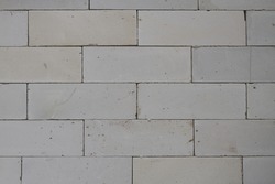 the surface of a light brick wall can be made into a background or 3d architectural rendering material