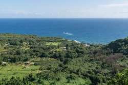 Scenic aerial vista of a small coastal village near Hana on the east side of Maui, Hawaii