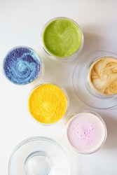 Colourful lattes: curcuma latte, matcha latte, blue matcha latte