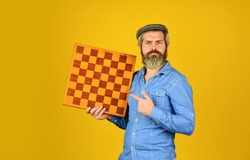 strategy ideas concept. bearded man hold chess board. intelligence quotient. human brain working. brainstorming concept. play chess tournament. Intelligence level measurement. level up your iq.