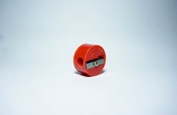 Red pencil sharpener isolated on a white background