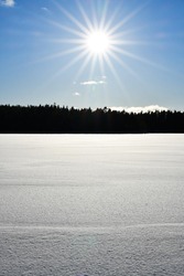 Tranquility at wintery lake in Finland