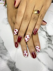 Beauty nails art maroon colour with floral pattern