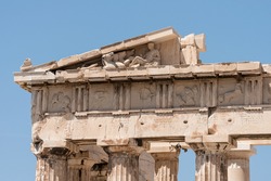 Detail of classical greek architecture, doric columns and frieze, from the Acropolis of Athens, Greece