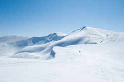 Winter snow covered mountain peaks in Europe. Great place for winter sports