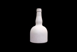 white bottle of gypsum isolated on a black background. High quality photo
