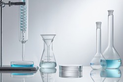 Empty podium glass with glass geometric platform. science laboratory test tubes, chemical laboratory equipment. Research and develop cosmetic in lab. 