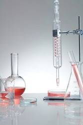 Research and develop product concept with scientific glassware. Concept laboratory tests and research natural extract making cosmetic