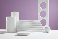 Front view of white podium and stairway with blank space in purple background abstract content