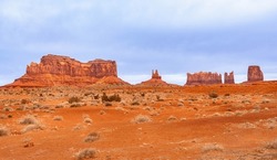 View of Monument Valley from Forrest rom US-163 road. Oljato-Monument Valley, Utah, United States.