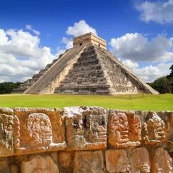 Chichen Itza Tzompantli the Wall of Skulls and Kukulkan pyramid El Castillo [Photo Illustration]