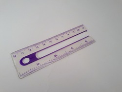 broken ruler made from plastic, only a half 