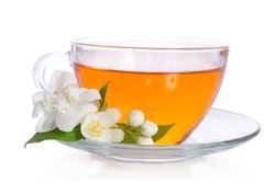 Glass cup of tea with jasmine on the white background