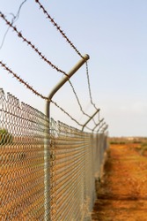 A barbed wire fence in outback Australia
