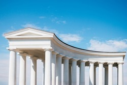 Colonnade architecture aesthetics white roofed columns, gazebo, alcove, gallery against blue sky