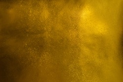Shiny golden textured paper sheet background