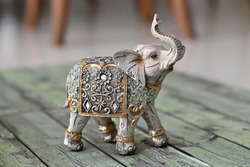 Elephant statue craft with vintage elegant gold and silver traditional ornaments.