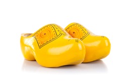 Wooden shoes, traditional dutch footwear for farmers, isolated on white background