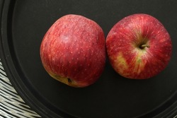 Closeup of Apples with black background.