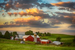 Sunset on a traditional dairy farm in rural Ohio in July