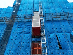 Electric elevator for construction site.