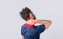 Close up of man with neck pain, a man with neck pain on isolated background, neck pain and stress concept, man with muscle pain