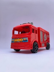 Fire truck toy on isolated white background and depht