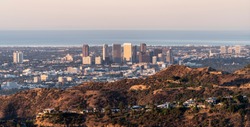 Morning panorama view of Century City and Beverly Hills with the Pacific Ocean in background.  Shot from mountaintop near popular Griffith Park in Los Angeles, California.  