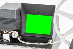 Old vintage 8mm film editor machine with chroma green screen.