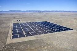 Solar farm in the middle of a vast North American Desert.