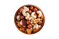 Wooden bowl with mixed nuts on white table top view. 