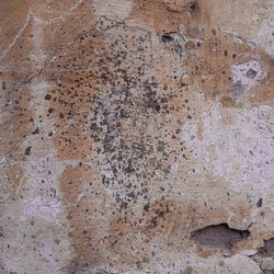 Abstract aged cement wall textured background. Dirty weathered cement wall with paint stains.
