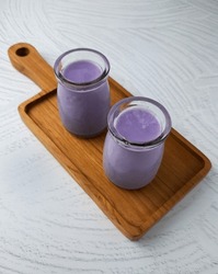 Silky pudding with taro flavor, which is a child's favorite. Takjil. Breaking fast Ramadhan.  Empty space available