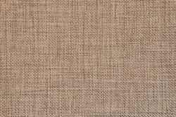 Seamless generic rough jute texture background in natural colours.