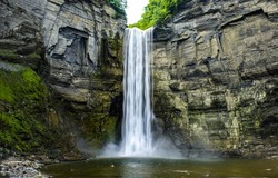 Waterfall cascade on mountain rocks