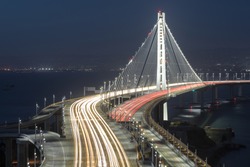 San Francisco-Oakland Bay Bridge Eastern Span at Night. Treasure Island, San Francisco, California, USA.