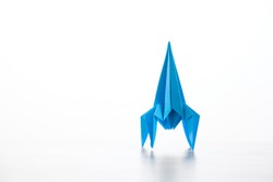 Paper homemade origami rocket. Craft work for children
