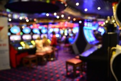 Blurred image of slots machines at the Casino
