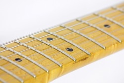 Guitar frets, markers, strings and black dots on white background